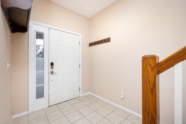 foyer with light tile patterned floors