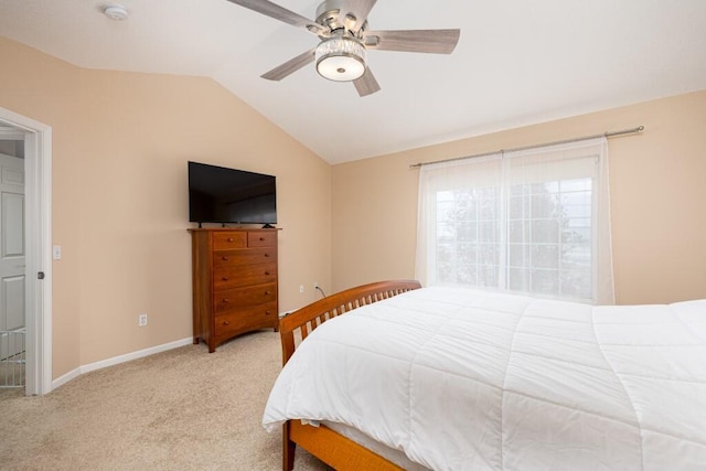 carpeted bedroom featuring ceiling fan and lofted ceiling