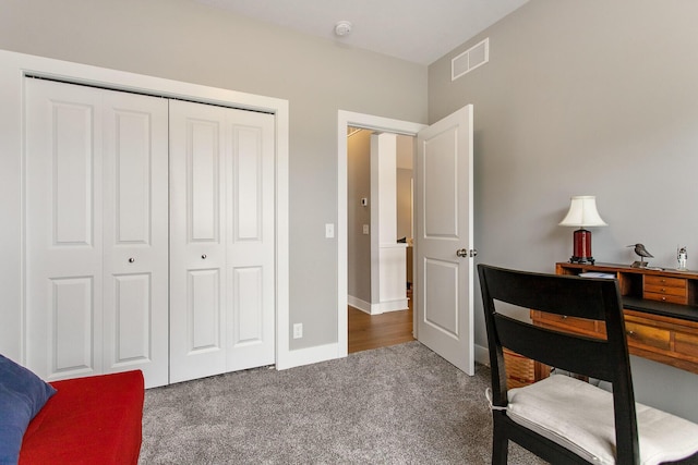 office with dark colored carpet