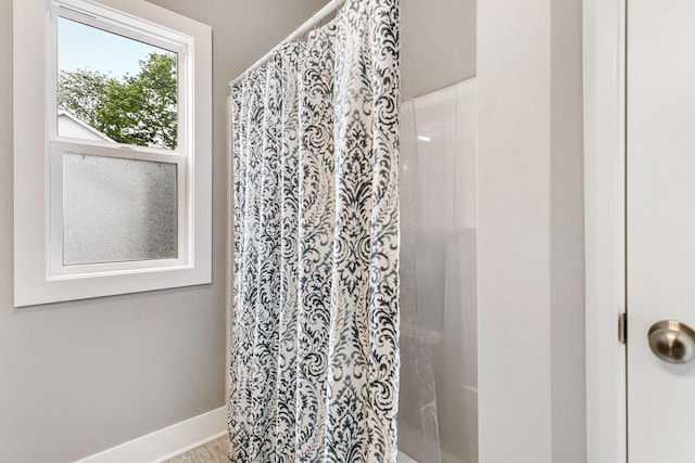 bathroom with curtained shower