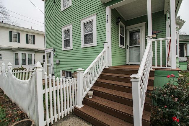 doorway to property with a porch