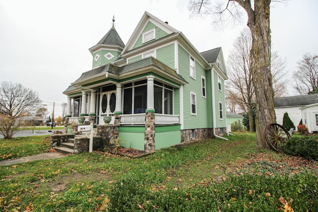 victorian house with a front lawn