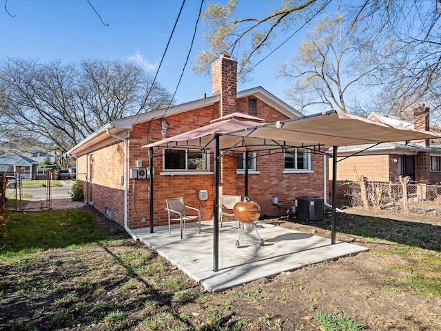 back of house featuring a patio and central air condition unit