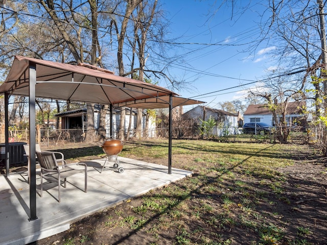 view of yard with a gazebo and central air condition unit