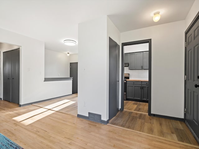 interior space with hardwood / wood-style flooring