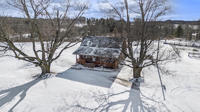 view of yard covered in snow