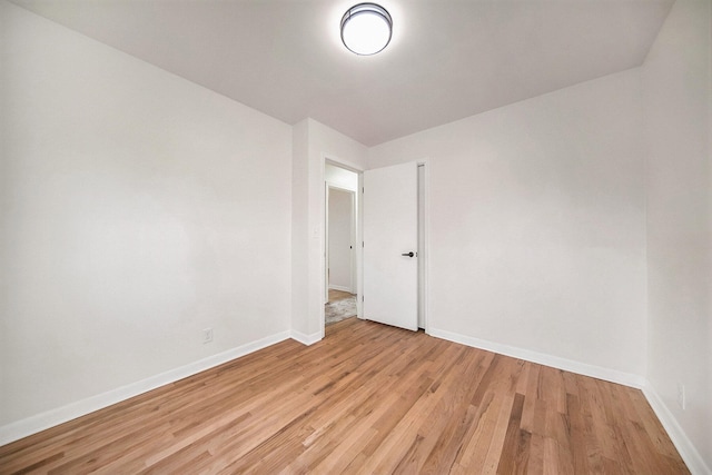 unfurnished room featuring light hardwood / wood-style floors