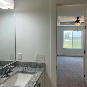 bathroom featuring vanity and ceiling fan