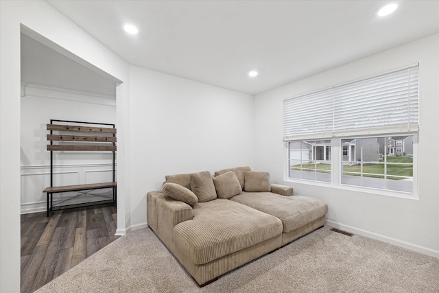 living room with wood-type flooring