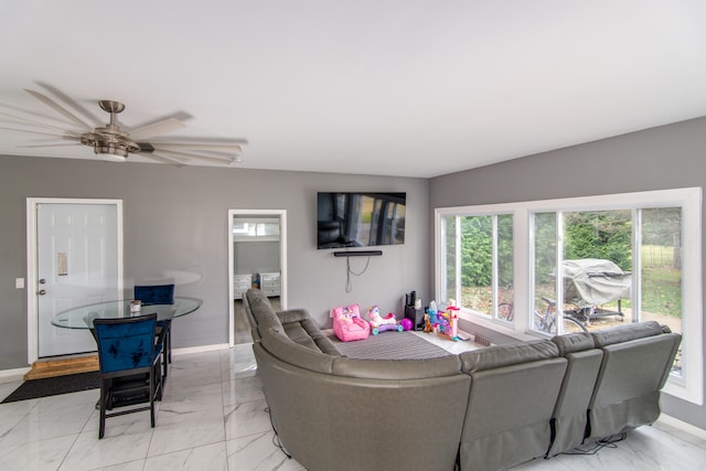 living room with ceiling fan