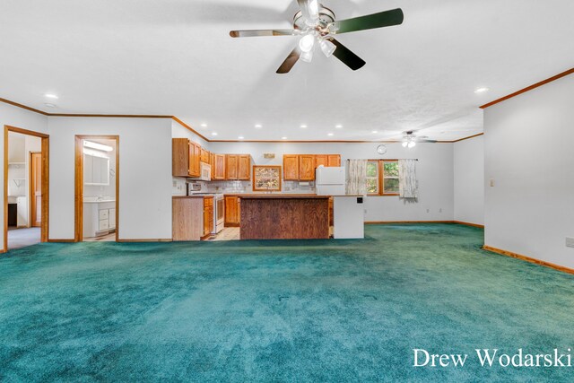 unfurnished living room featuring light carpet and ornamental molding