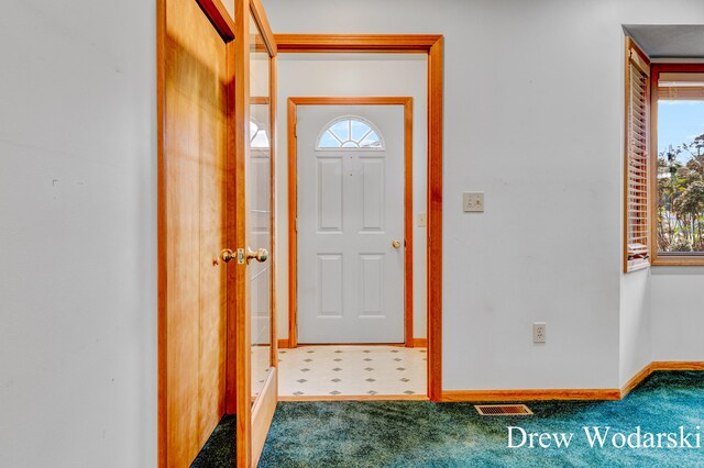 view of carpeted entryway