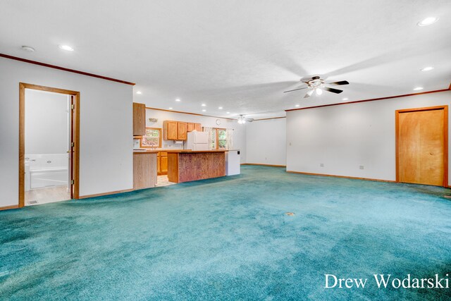 unfurnished living room with carpet flooring, crown molding, and ceiling fan