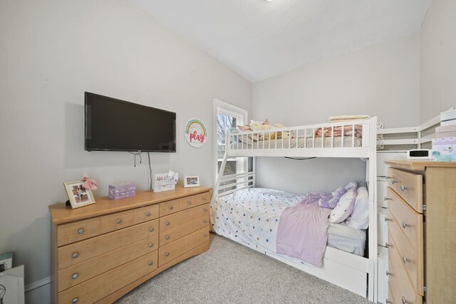 bedroom with light carpet