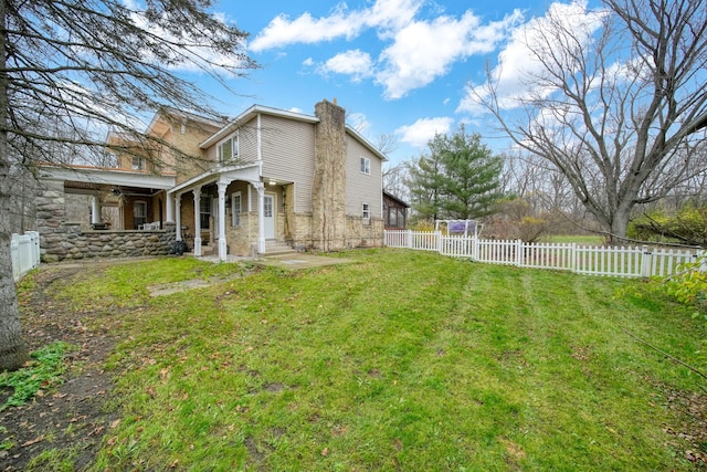 view of home's exterior featuring a yard