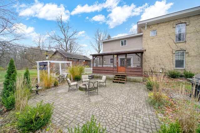 back of house featuring a patio