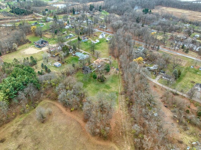 birds eye view of property featuring a rural view