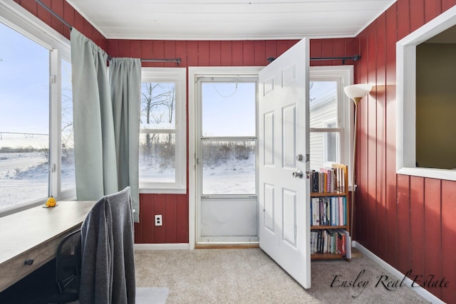 sunroom / solarium featuring plenty of natural light