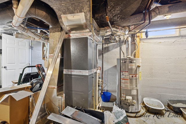 utility room featuring gas water heater