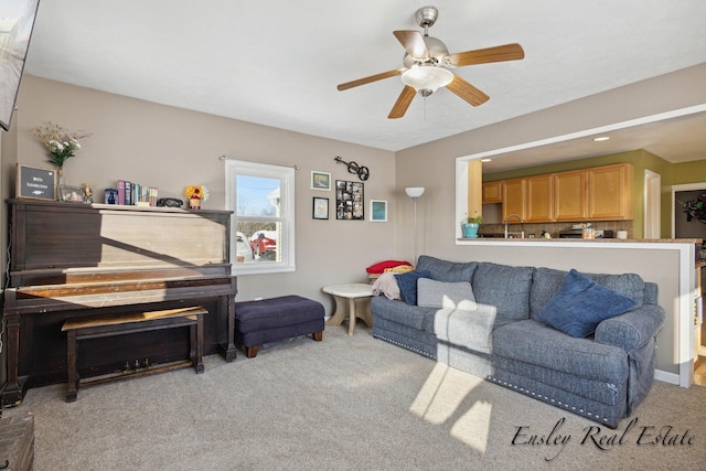 living room featuring a ceiling fan, carpet floors, and recessed lighting