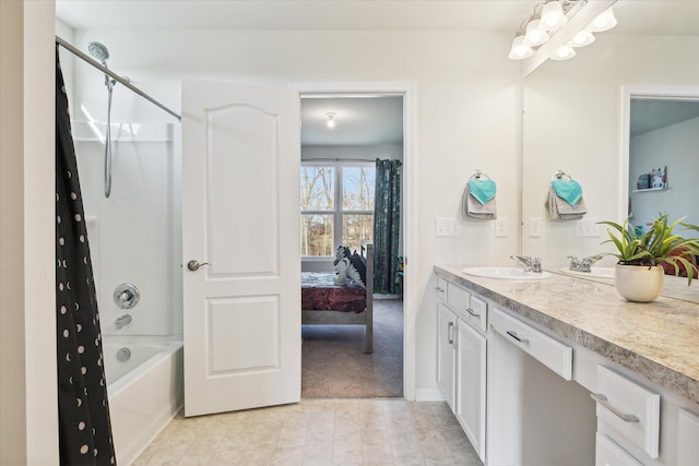 bathroom with shower / bath combo and vanity