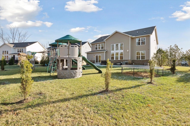 view of jungle gym featuring a yard