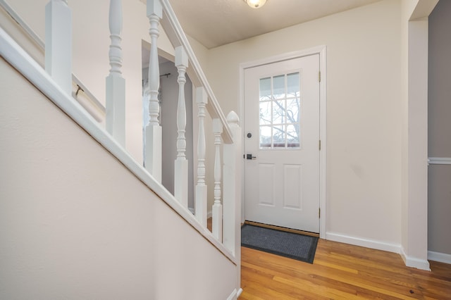 foyer entrance featuring hardwood / wood-style flooring