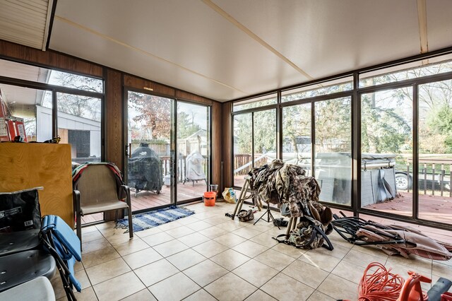 sunroom / solarium with vaulted ceiling