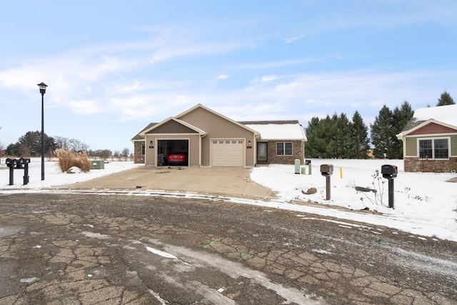 view of front of home with a garage