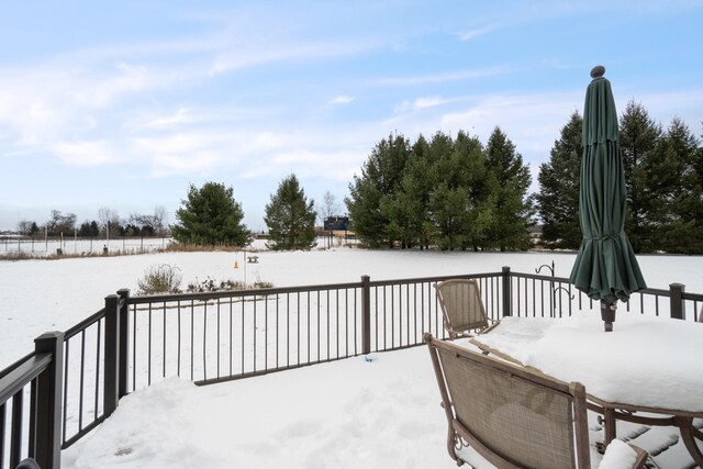 view of snow covered deck