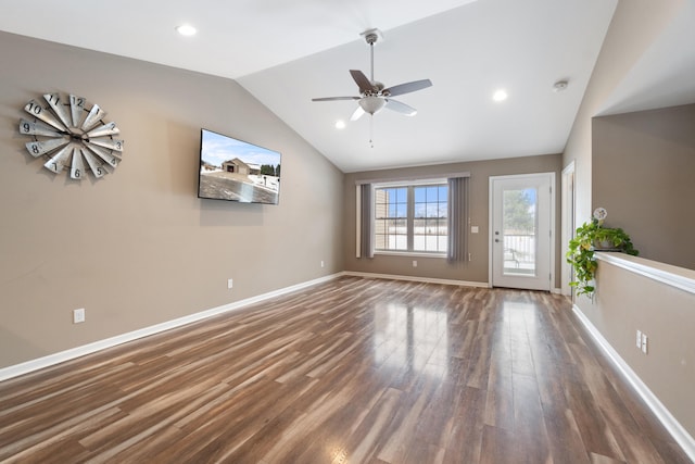 unfurnished living room featuring ceiling fan, lofted ceiling, and dark wood-type flooring