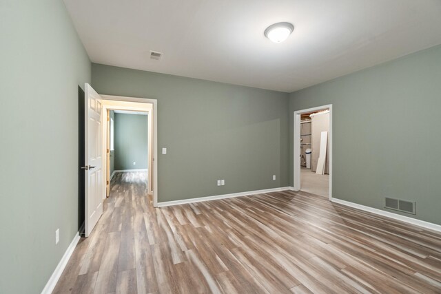 unfurnished bedroom with light hardwood / wood-style flooring