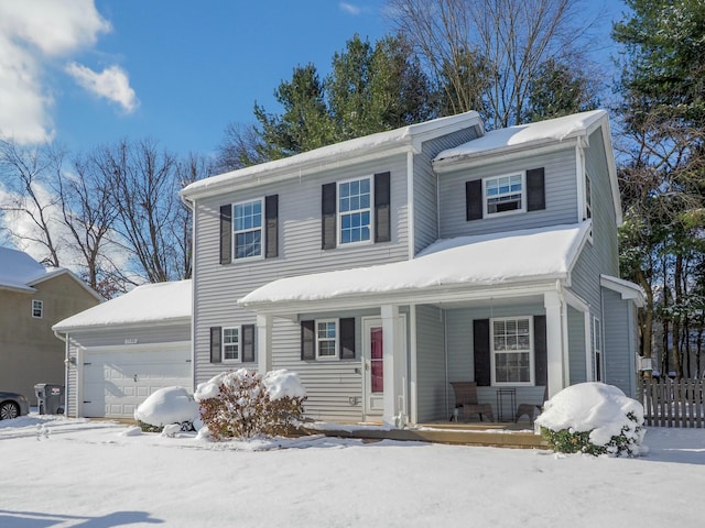 view of front of house with a porch and a garage