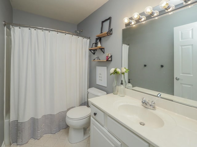 bathroom featuring walk in shower, vanity, and toilet