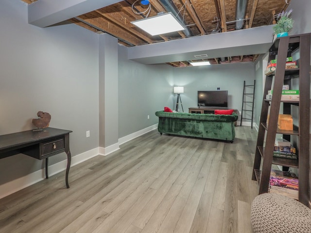 basement with light wood-type flooring