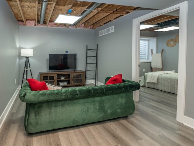 living room with hardwood / wood-style floors