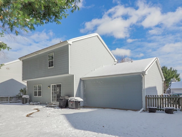 view of snow covered property