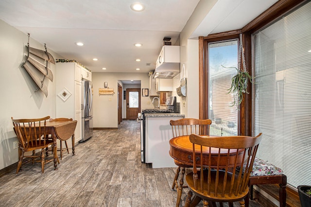 dining room featuring hardwood / wood-style floors