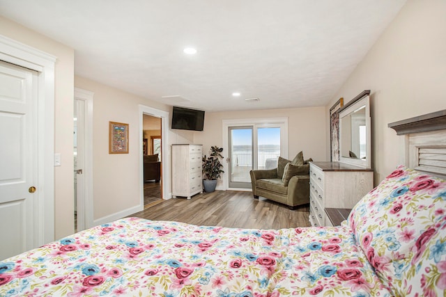 bedroom with light hardwood / wood-style flooring