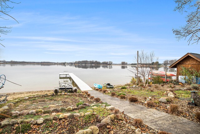 view of dock with a water view