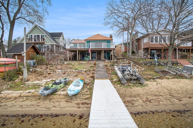 rear view of house with a deck