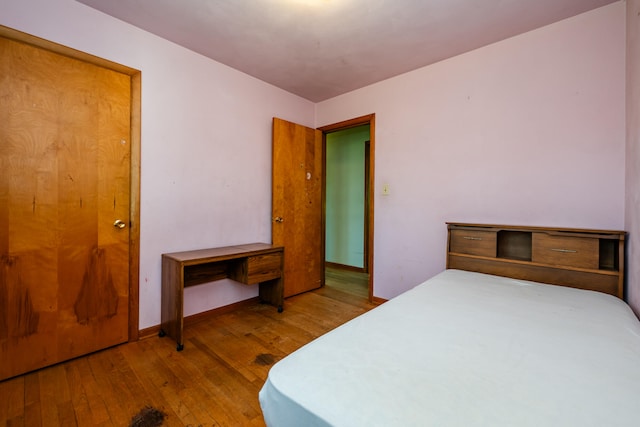 bedroom featuring hardwood / wood-style floors