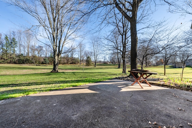 exterior space featuring a yard and a patio