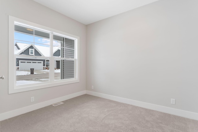 view of carpeted spare room