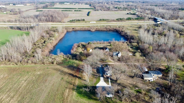 aerial view with a water view and a rural view