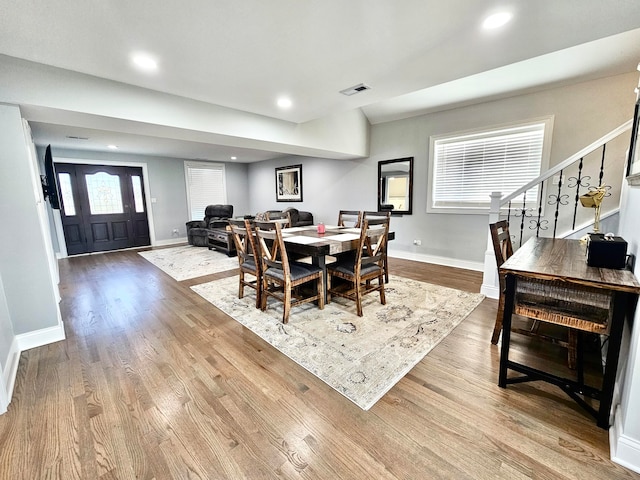 dining space featuring light hardwood / wood-style flooring