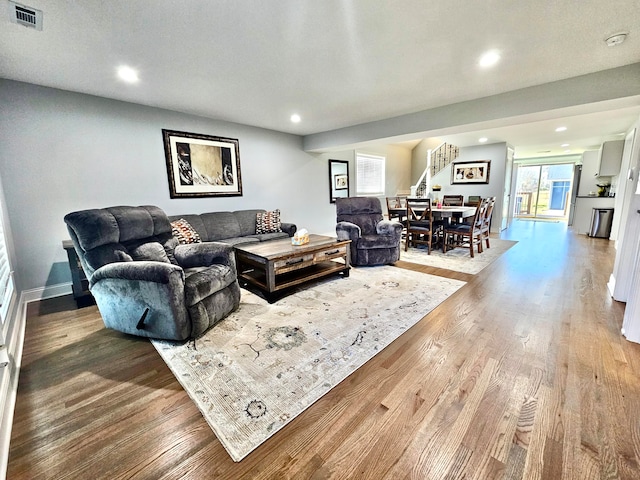 living room with hardwood / wood-style flooring