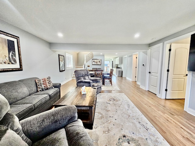 living room with light hardwood / wood-style floors