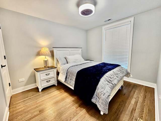 bedroom featuring light wood-type flooring