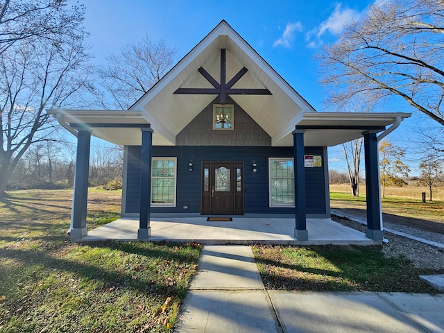 view of front of property featuring covered porch